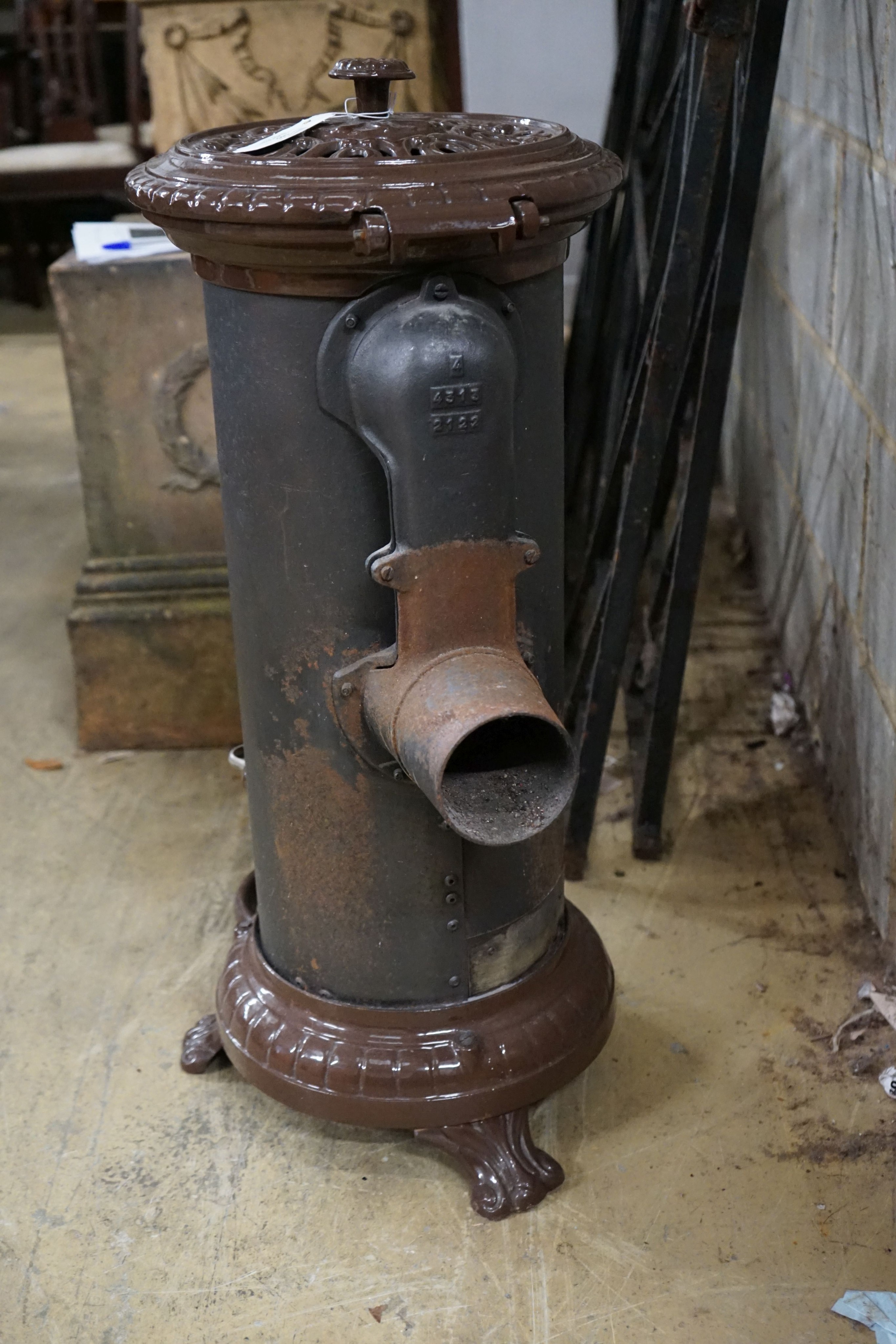 A cast iron stove, height 80cm